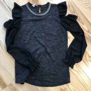 Maurices small shirt with beaded neckline.
